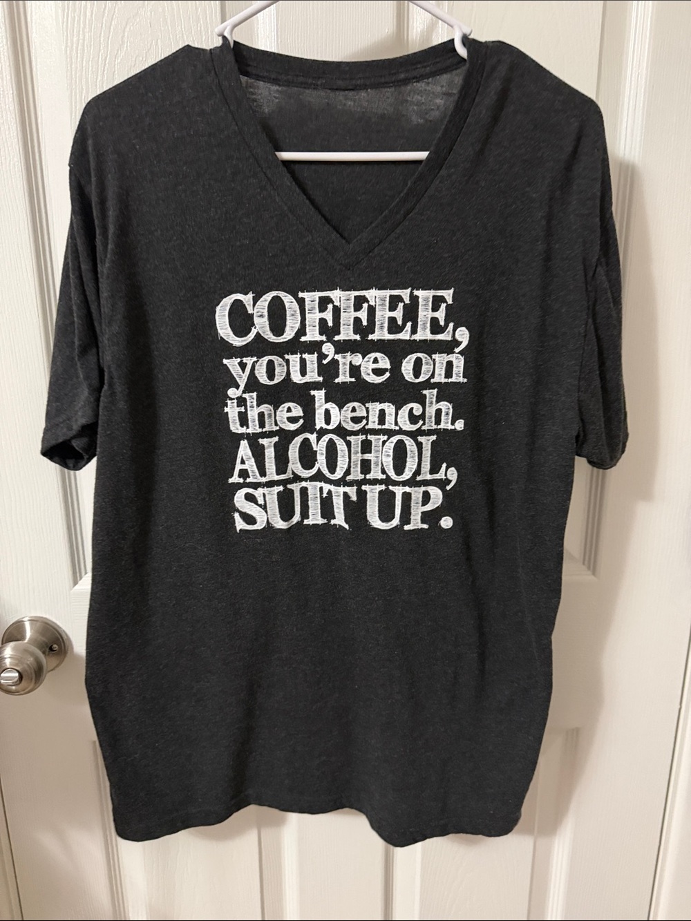 Graphic V‑Neck Tee with White Slogan